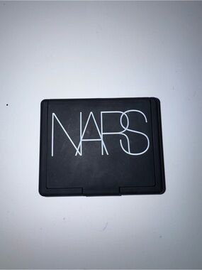 NARS exhibit a blush